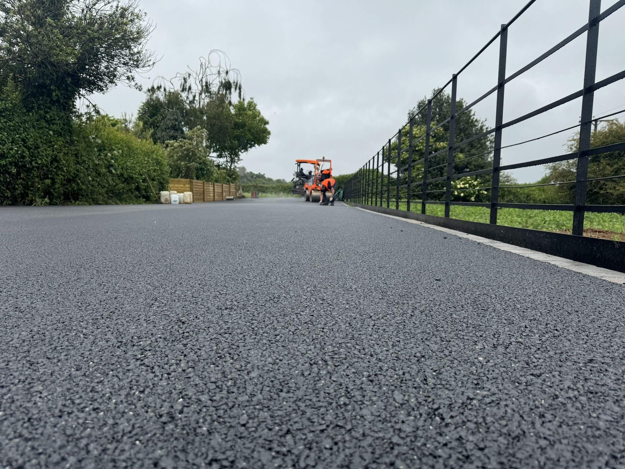 Close-up of smooth newly laid tarmac road by JC Surfacing Close-up of smooth newly laid tarmac road by JC Surfacing